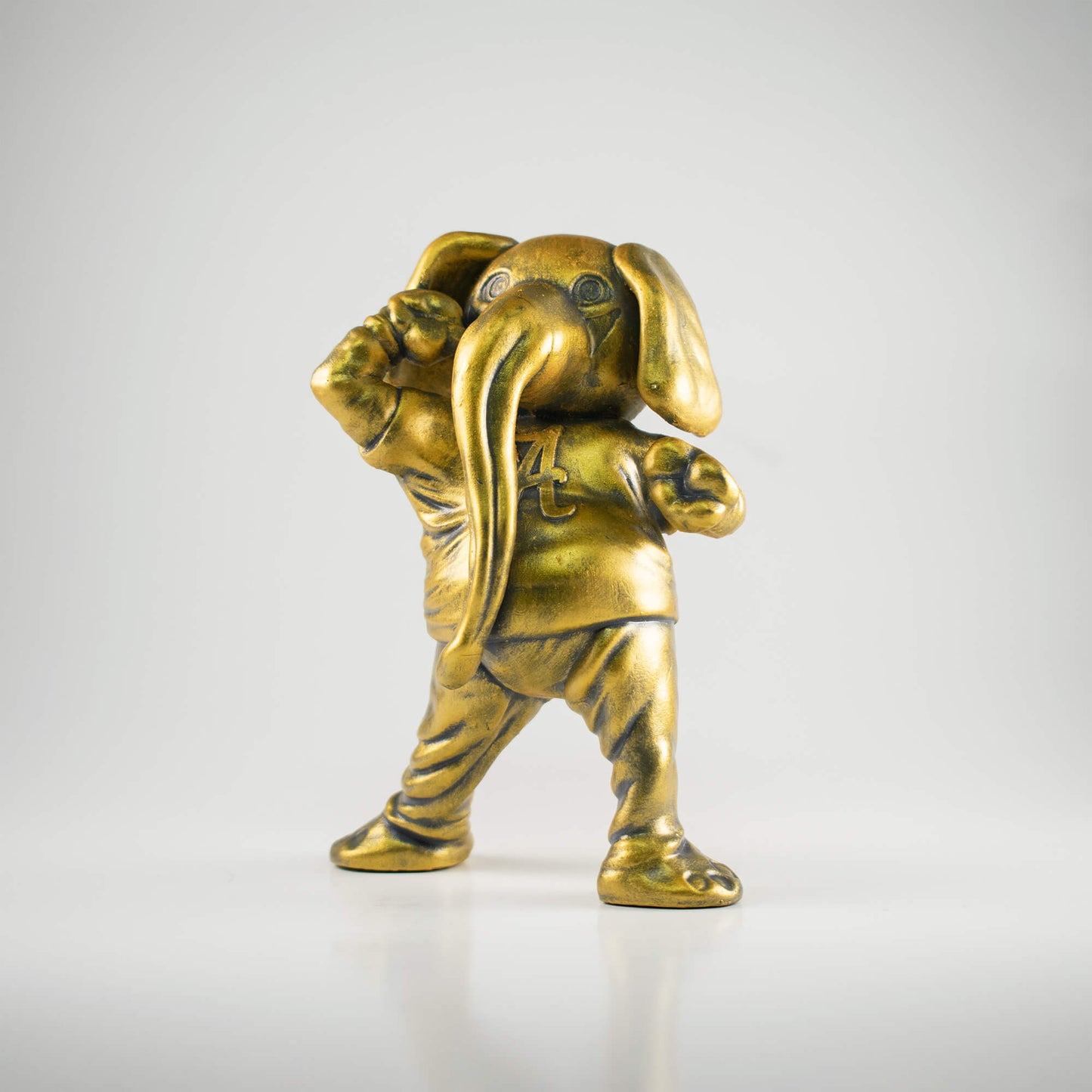 Collectible golden figure of University of Alabama Crimson Tide mascot Big Al